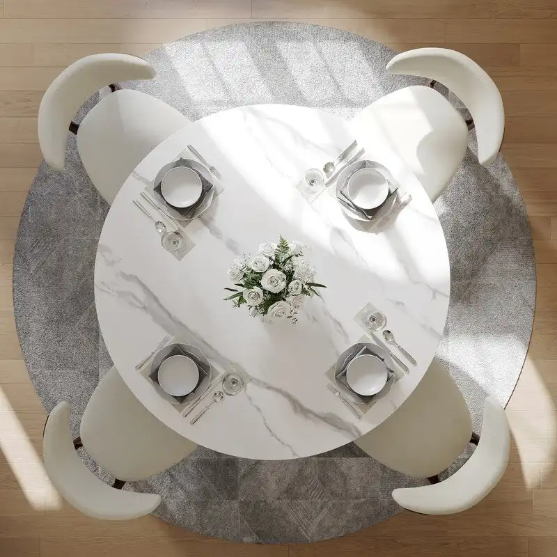 Modern Round Dining Table – White Sintered Stone Top & Bronze Carbon Pedestal