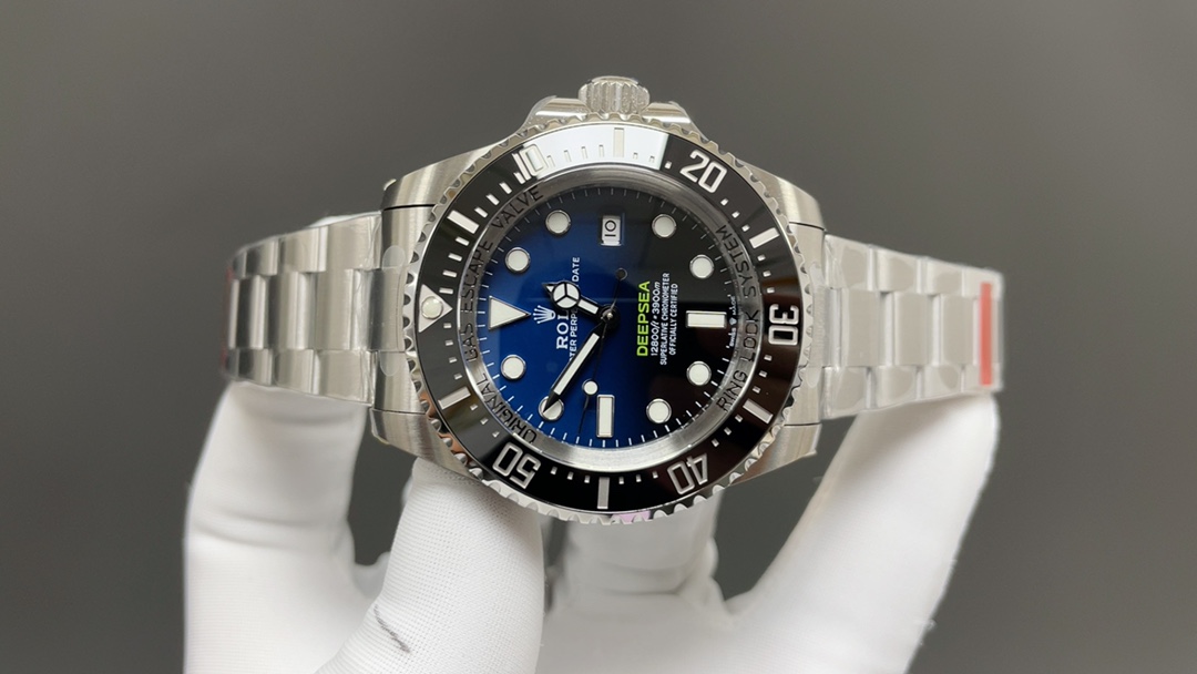 Replica Rolex Deepsea blue dial angled view with oyster bracelet and bezel