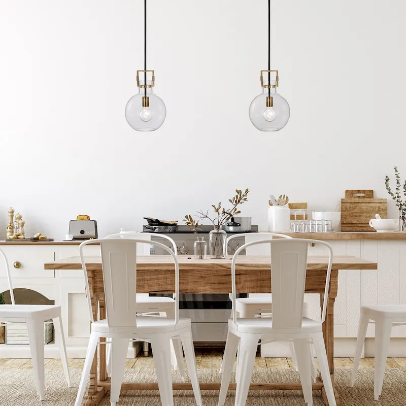 Black and Antique Gold 1-Light 10 Inch Globe Shaped Clear Glass Pendant