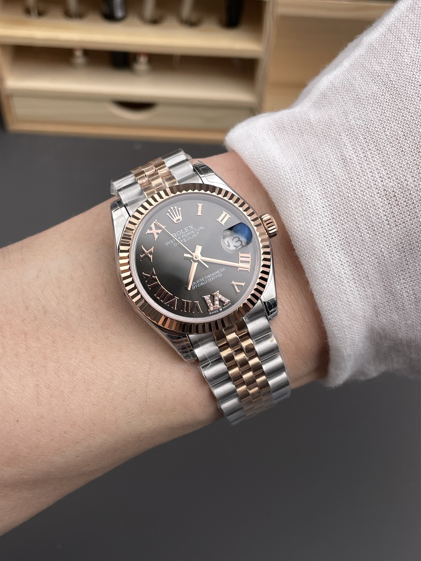 Rolex replica Datejust worn on wrist with two tone Jubilee bracelet