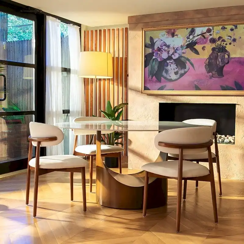 Modern Round Dining Table – White Sintered Stone Top & Bronze Carbon Pedestal