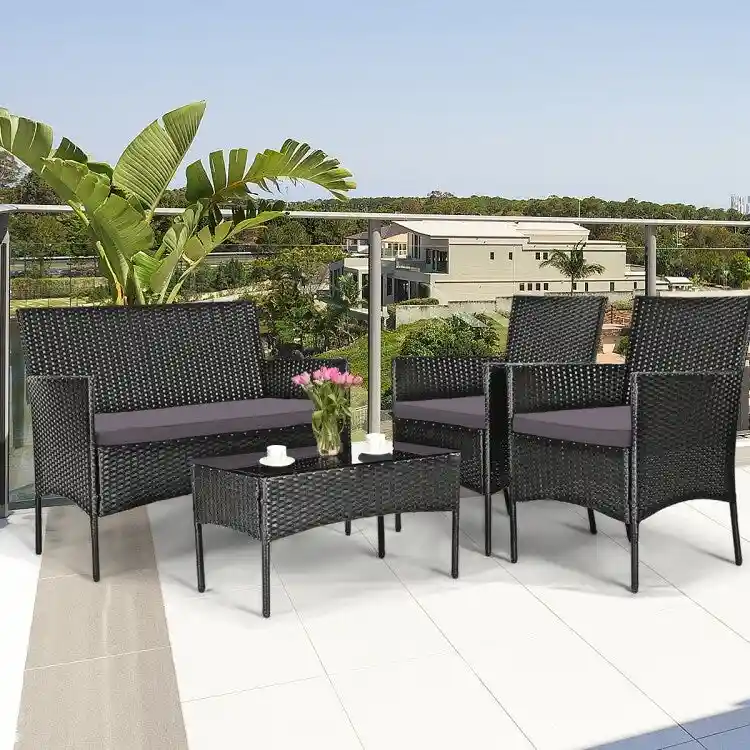 4 Pieces Patio Rattan Cushioned Sofa Set with Tempered Glass Coffee Table - 24 x 23.5 x 33 (L x W x H)