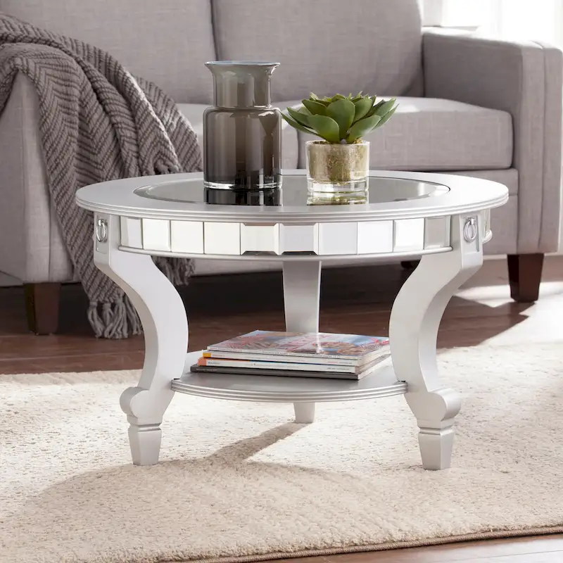 SEI Furniture Olivia Contemporary Mirrored Round Coffee Table in Matte Silver Details and Shelf