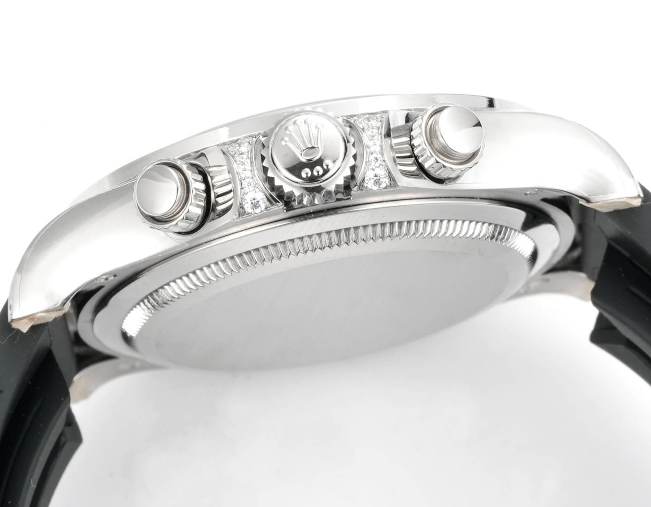 Rolex Daytona side profile showing pushers, crown guard and diamond setting