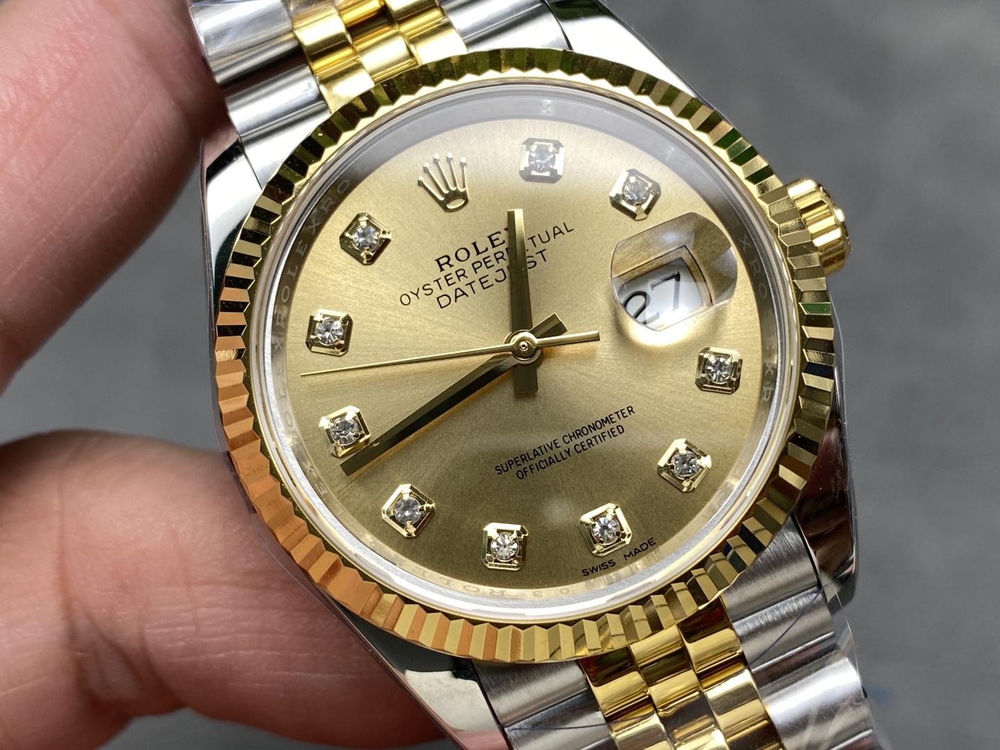 Rolex replica Datejust champagne diamond dial close-up