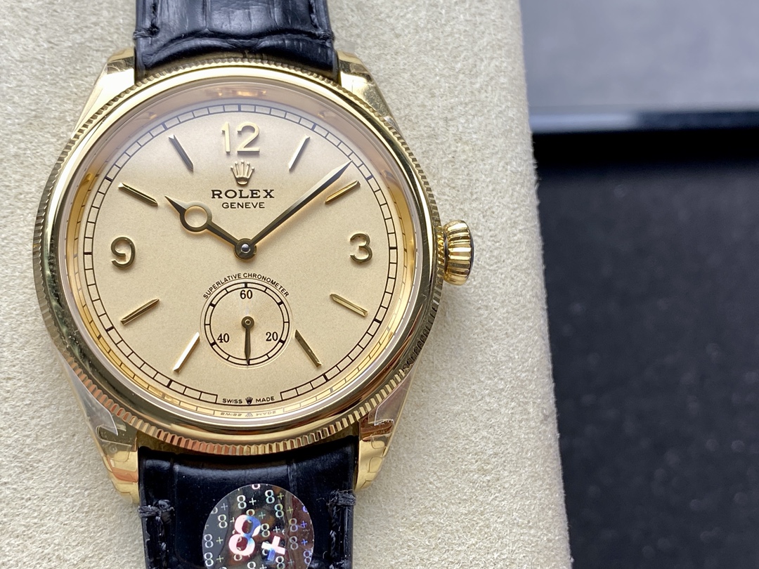 Rolex replica gold case with cream dial and sub-seconds register at 6 o'clock