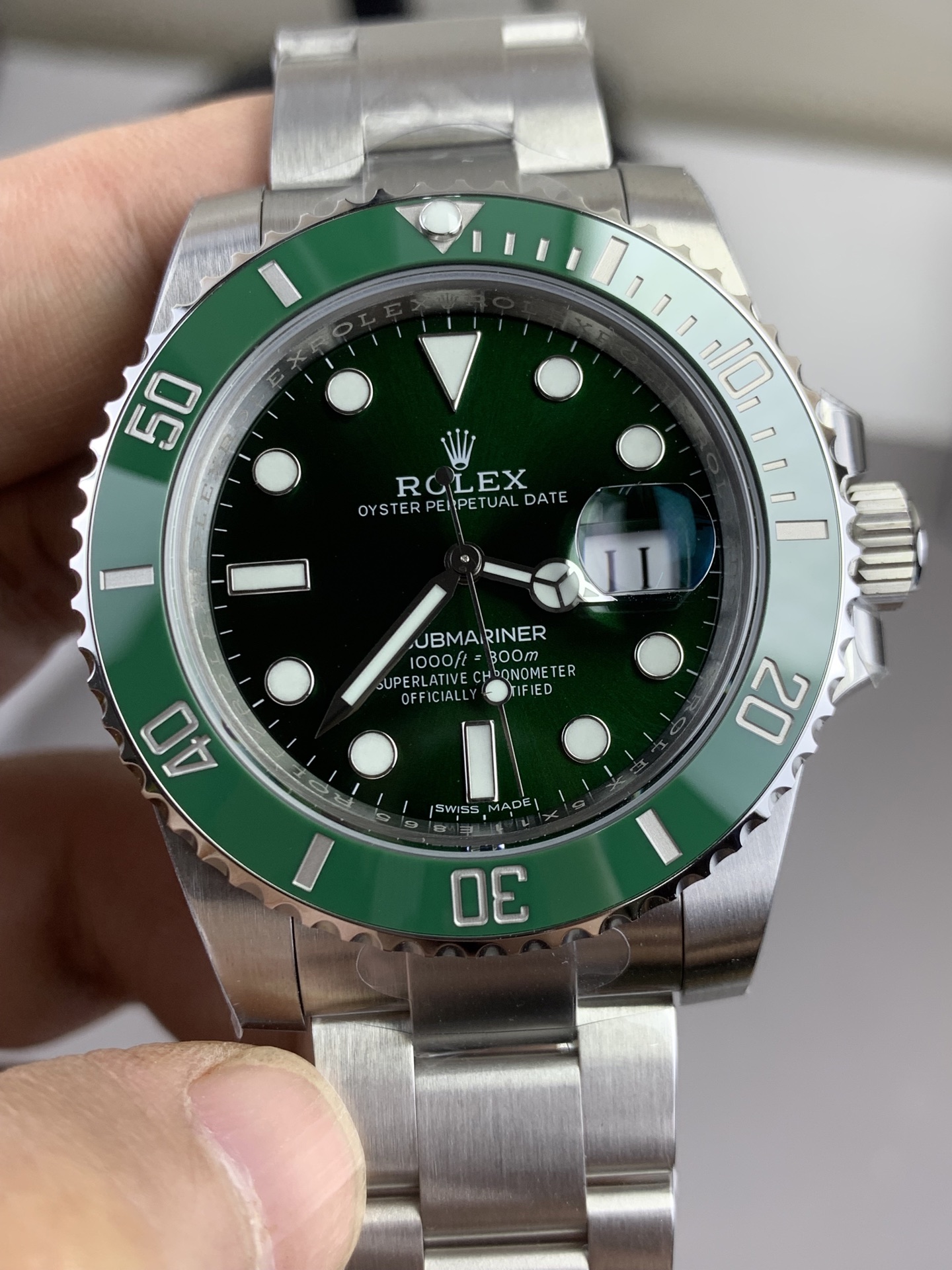 Top-tier Rolex Submariner replica with green ceramic bezel and 3135 clone movement
