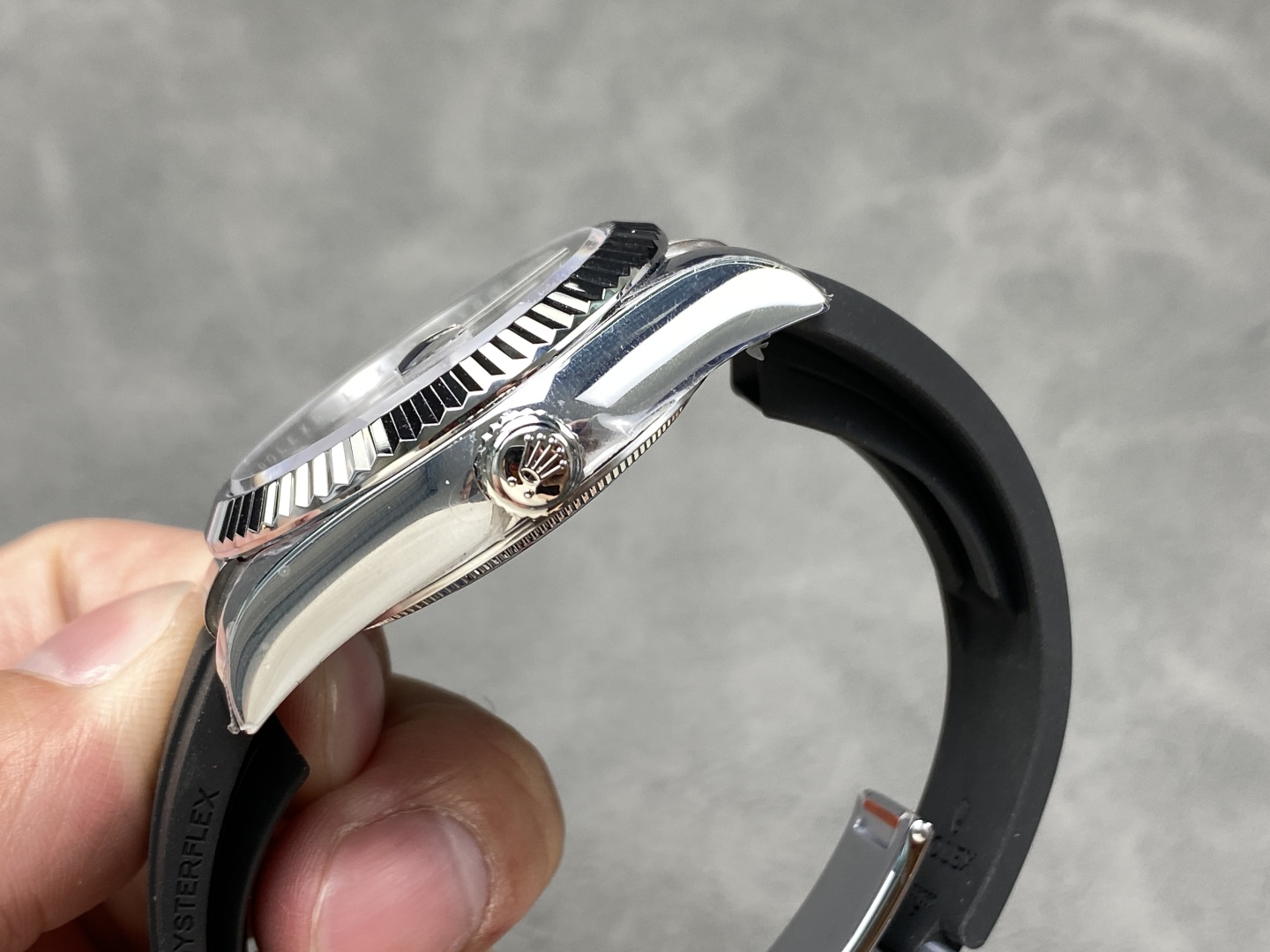 Side profile of Rolex Sky-Dweller replica case showing crown, crystal height, and Oysterflex strap