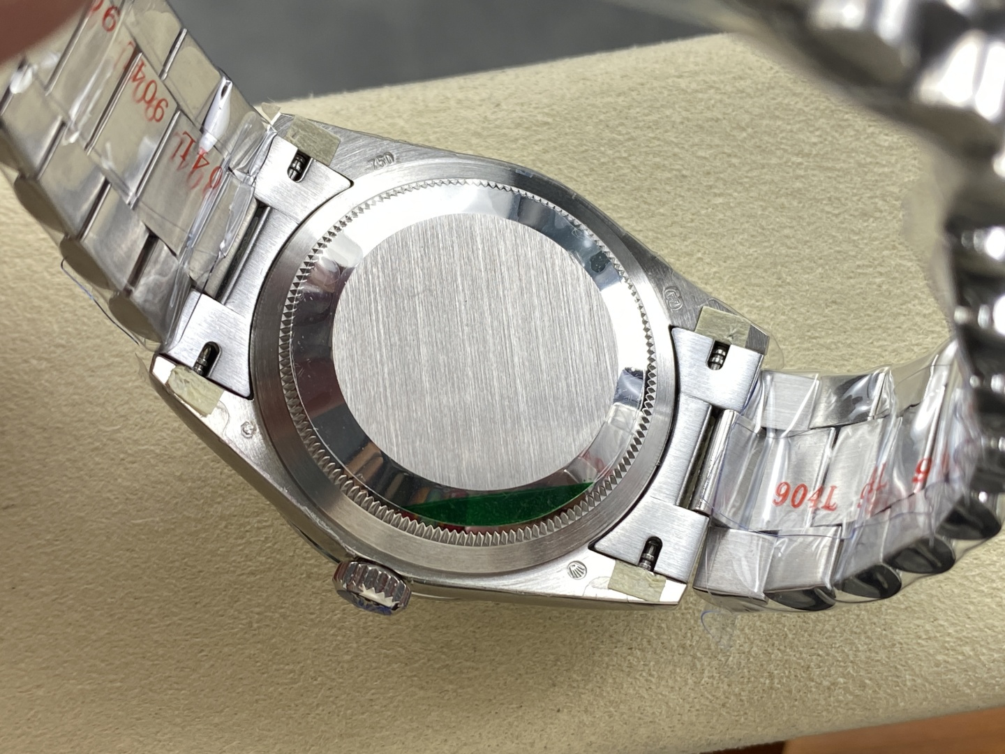 Rolex Day-Date replica solid case back with 904L stamp and green protective sticker
