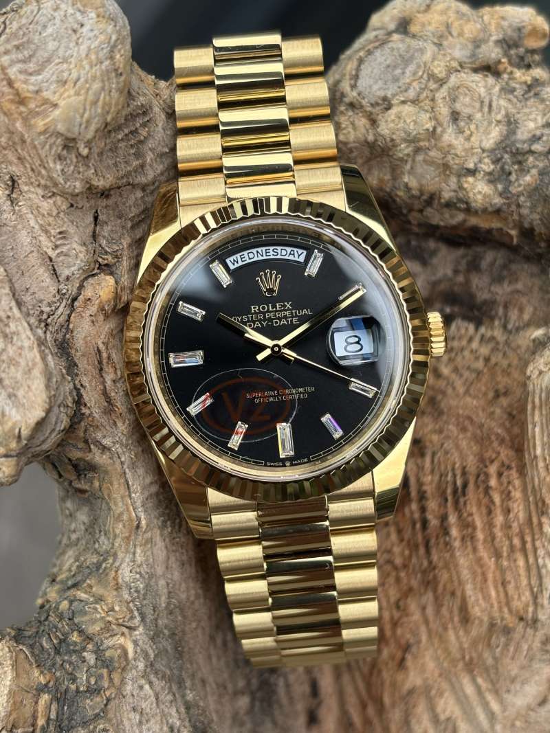 Rolex Day-Date replica 3255 yellow gold full front view on wood texture