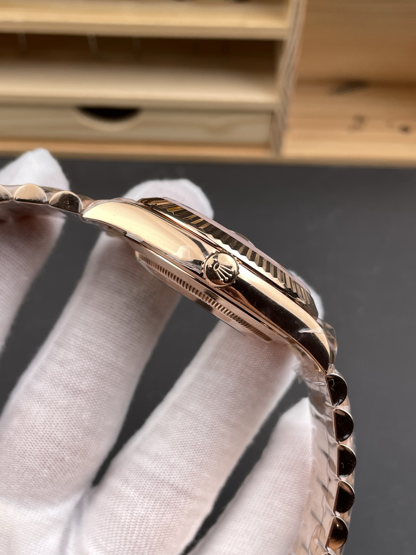 Rose gold Rolex Day-Date super clone side profile with fluted bezel and crown