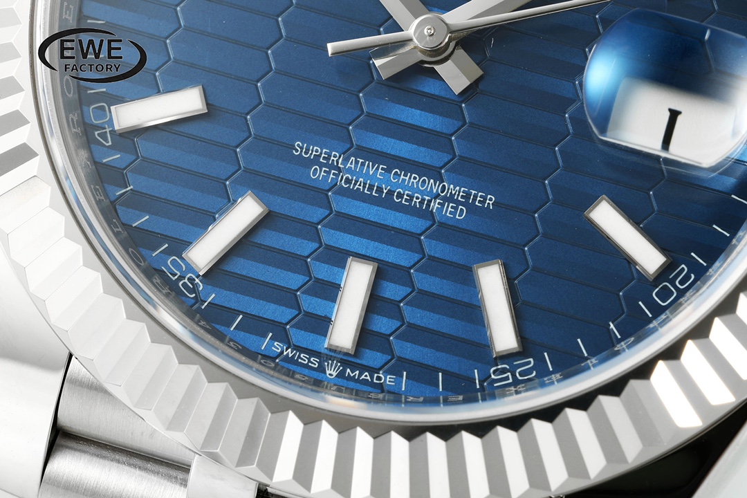 Macro close up of replica Rolex blue fluted dial and date window