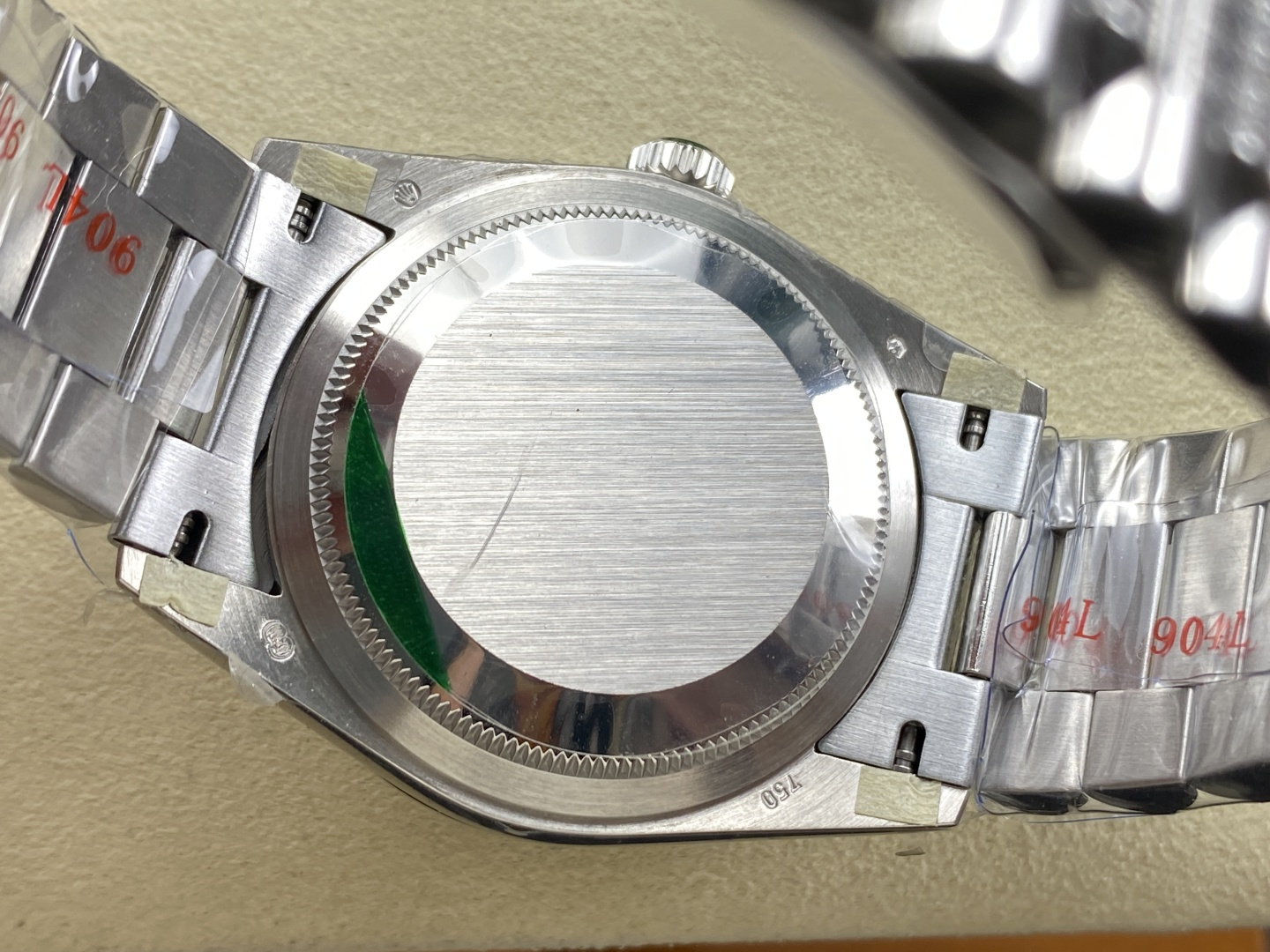 Replica Day-Date 40 case back with 904L steel engravings and fluted edge