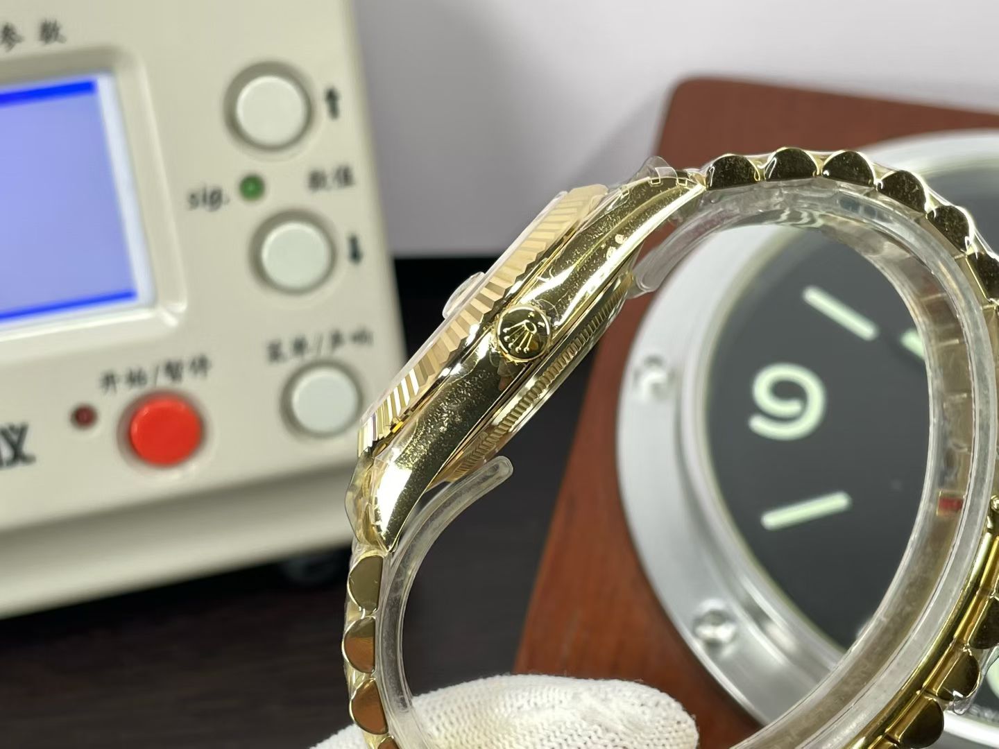 Gold Rolex Day-Date replica side profile showing case thickness and crown