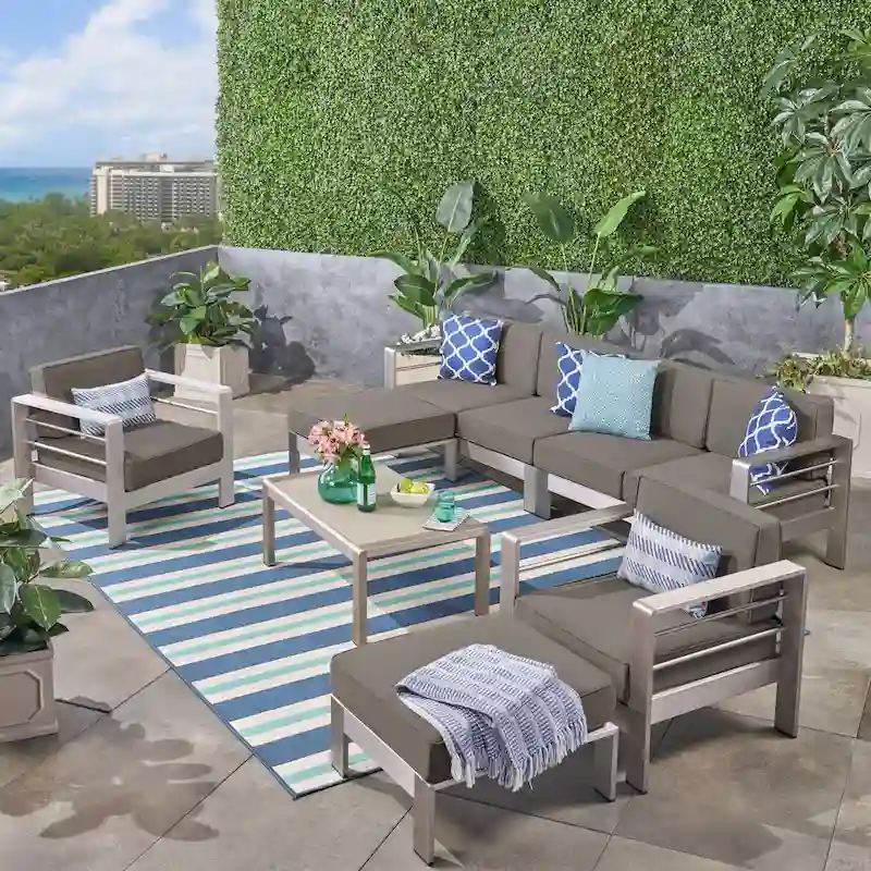 Cape Coral Outdoor 6-Seater Aluminum Sectional Sofa Set with Ottomans and Coffee Table by Christopher Knight Home