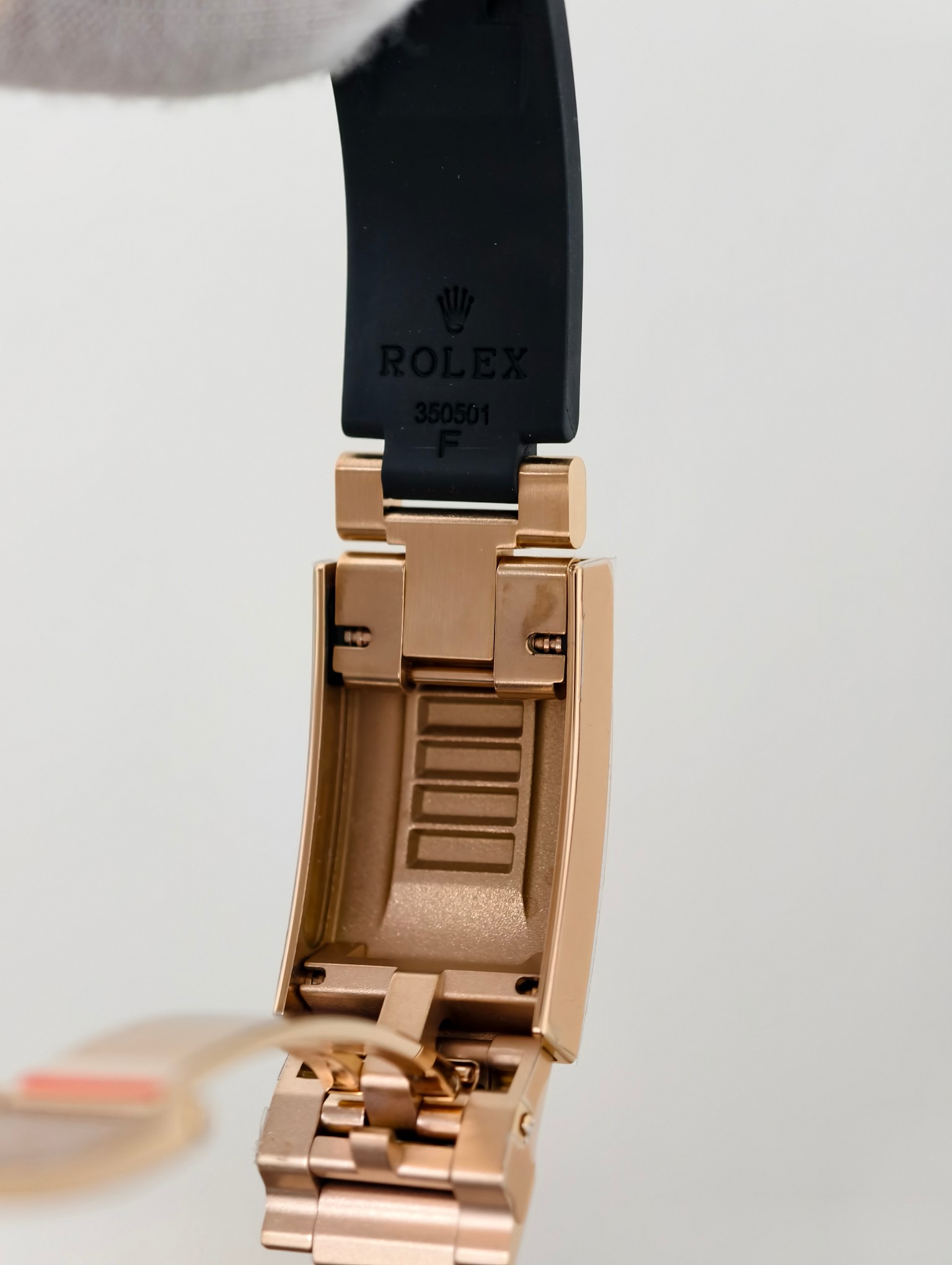 High-quality rose gold chronograph replica watch with black dial and tachymeter bezel