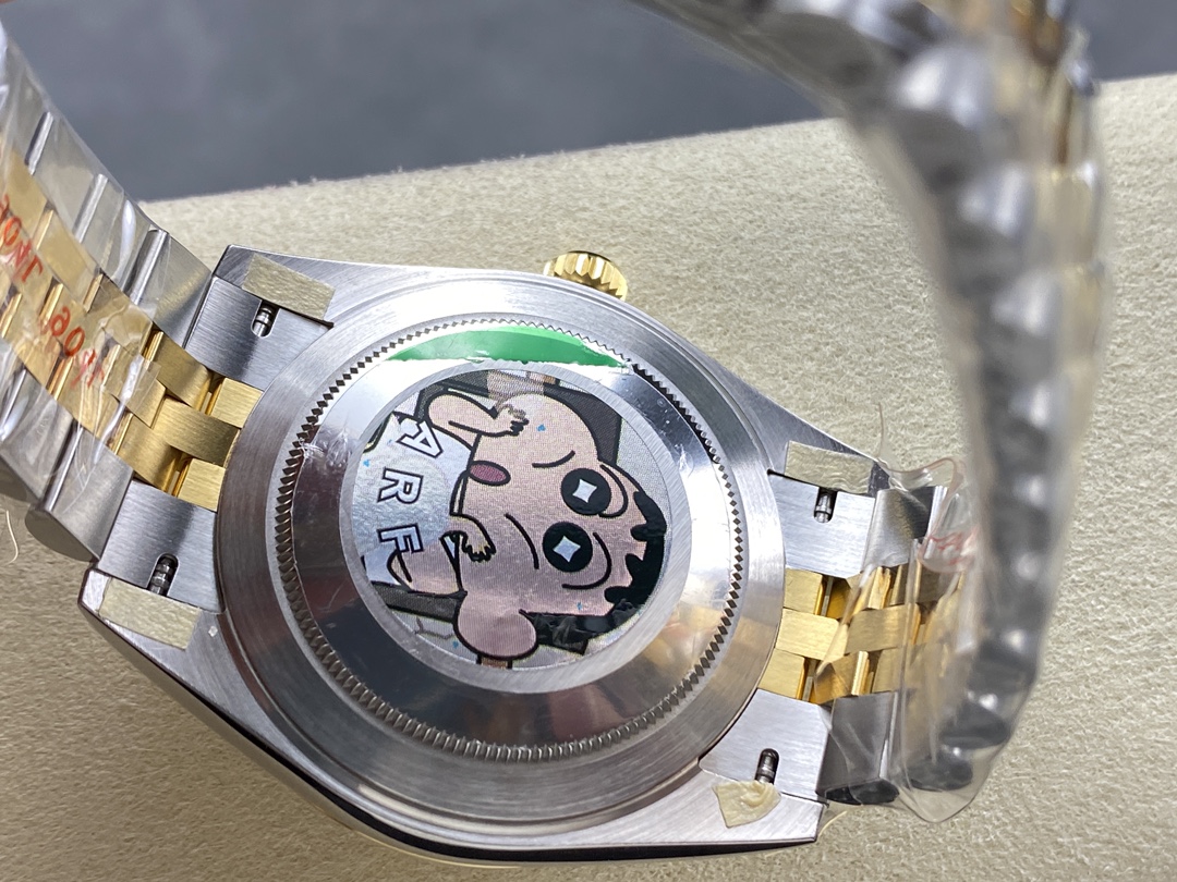Caseback view of Datejust replica with bracelet and protective factory stickers