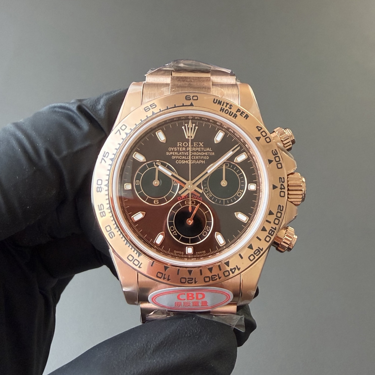 Rose gold Rolex Daytona super clone watch with black dial and tachymeter bezel
