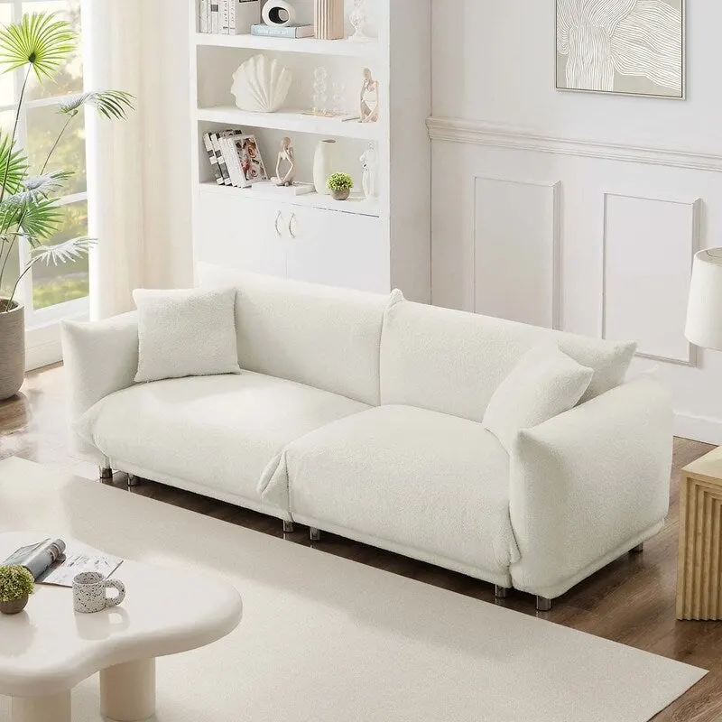 White Velvet Sofa with Pillows and Metal Legs