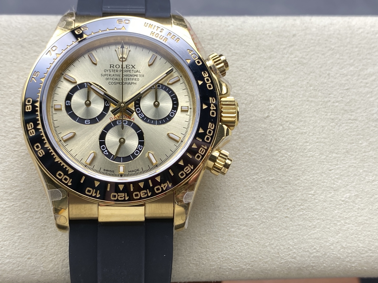 Gold Rolex Daytona replica with black rubber strap