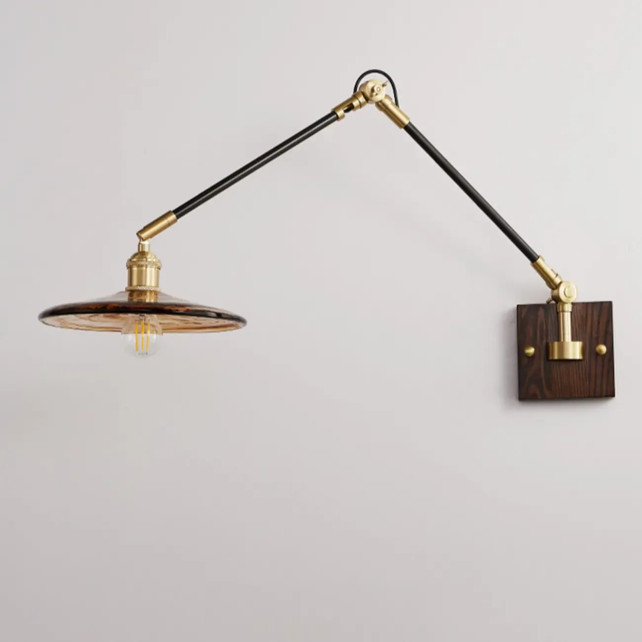 Industrial Amber Swing Arm LED Wall Sconce with Glass Shade