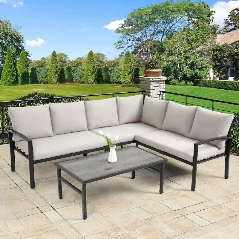 4-Piece Steel Patio Furniture Set with Beige Cushions and Coffee Table