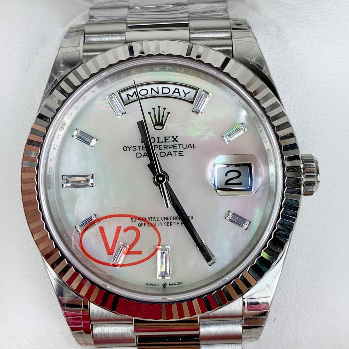 Close-up of Day-Date dial with date window and V2 marking