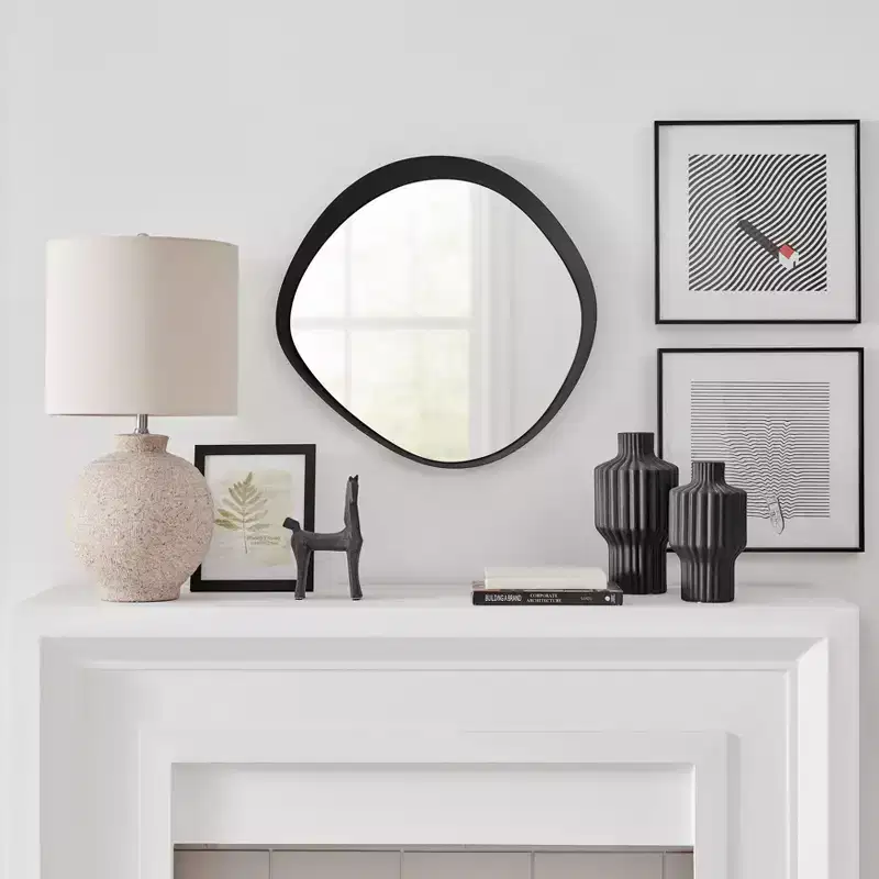 Sonya 24-inch Contemporary Asymmetrical Round Wall Mirror with Raised Black Iron Frame