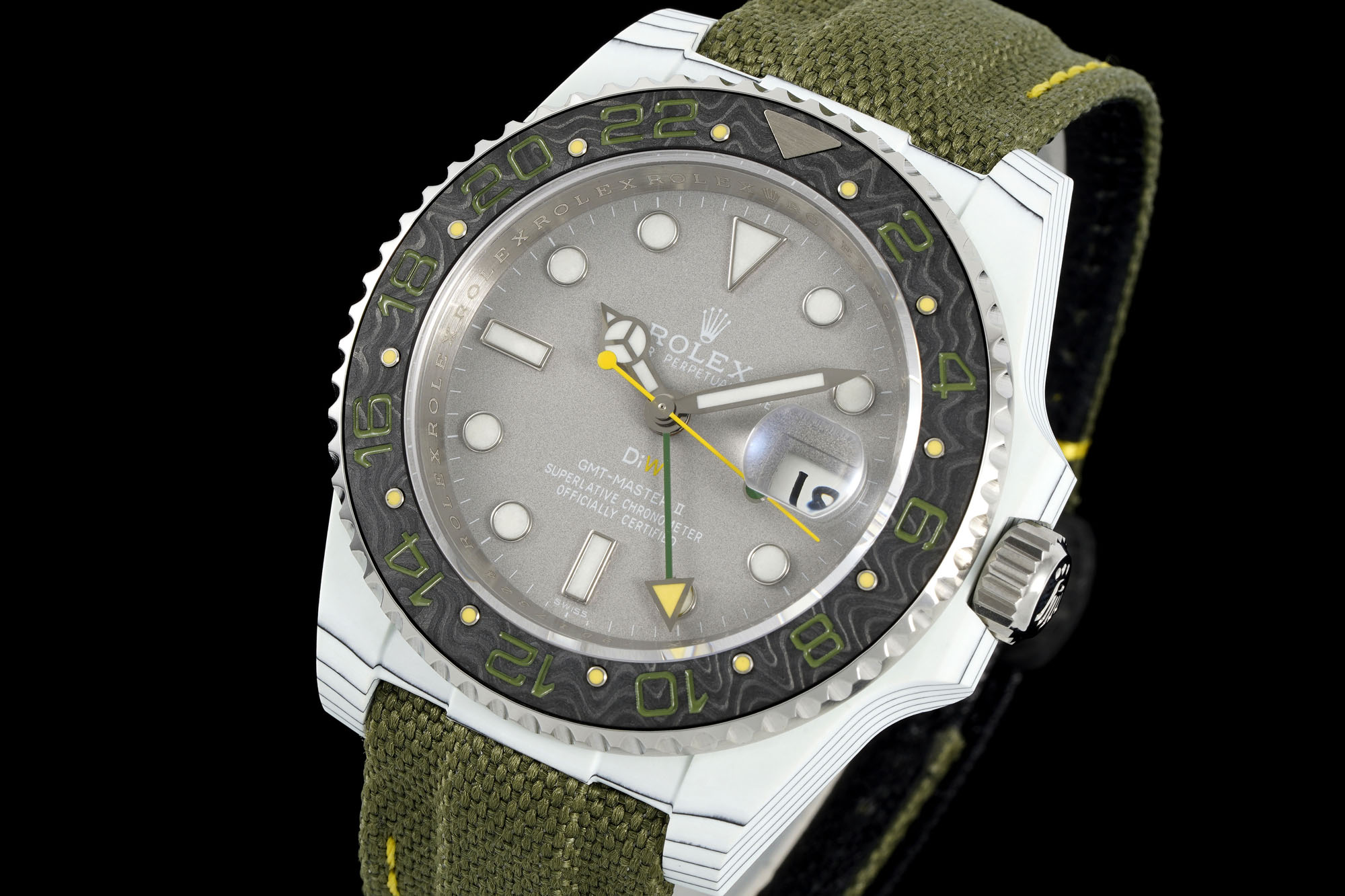 Rolex GMT-Master II dial close-up with green GMT hand and date window