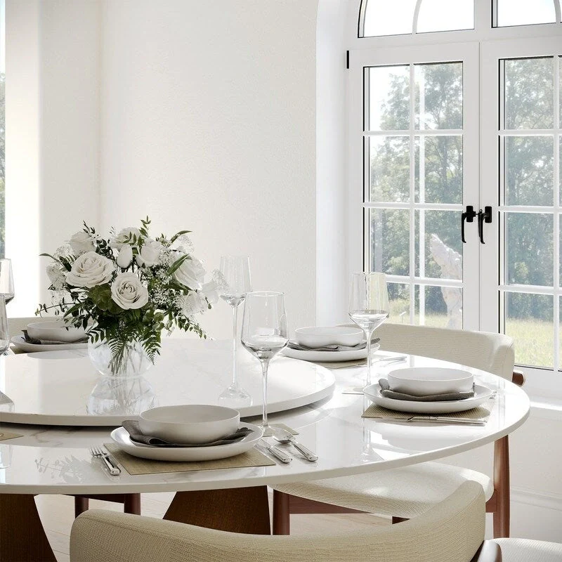 Modern Round Dining Table – White Sintered Stone Top & Bronze Carbon Pedestal