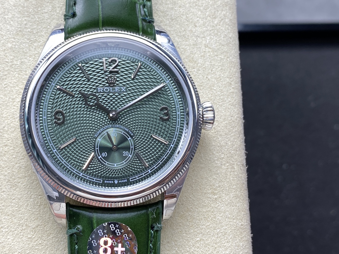 Replica Rolex green dial with guilloche texture and small seconds hand