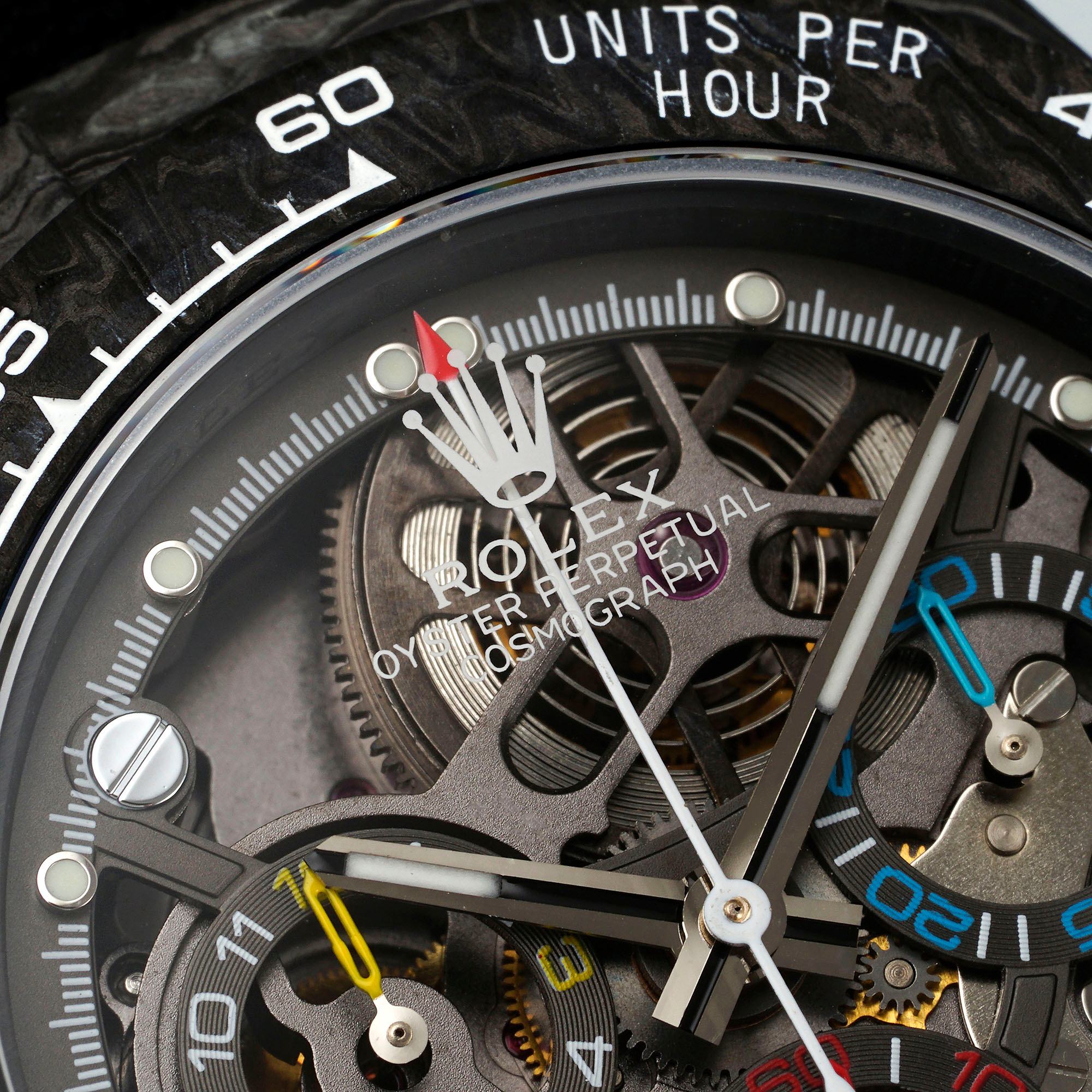 Rolex Daytona skeleton dial macro detail with colored sub-dial hands