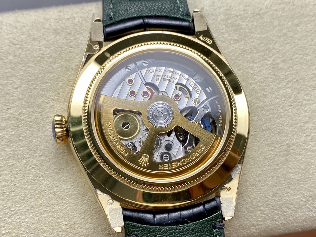 Close-up of the 7140 clone movement with gold rotor and exhibition caseback