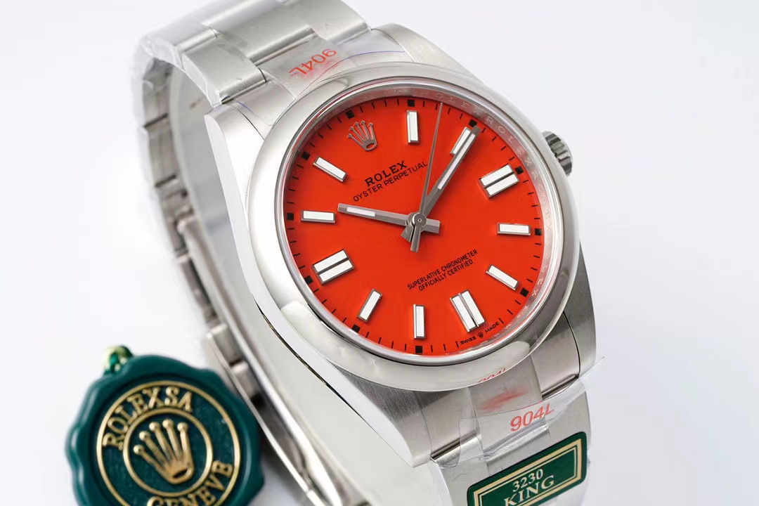 Red dial Rolex Oyster Perpetual replica with 3230 movement and green hang tag