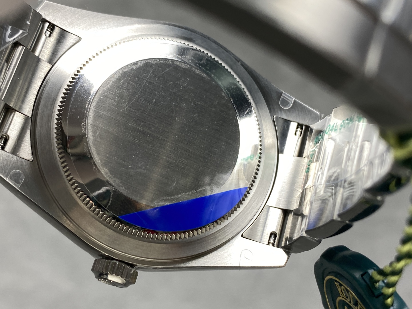 Caseback and bracelet underside of Rolex Sky-Dweller replica showing stainless steel finishing