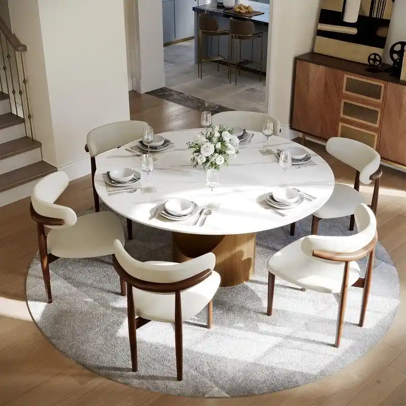 Modern Round Dining Table – White Sintered Stone Top & Bronze Carbon Pedestal