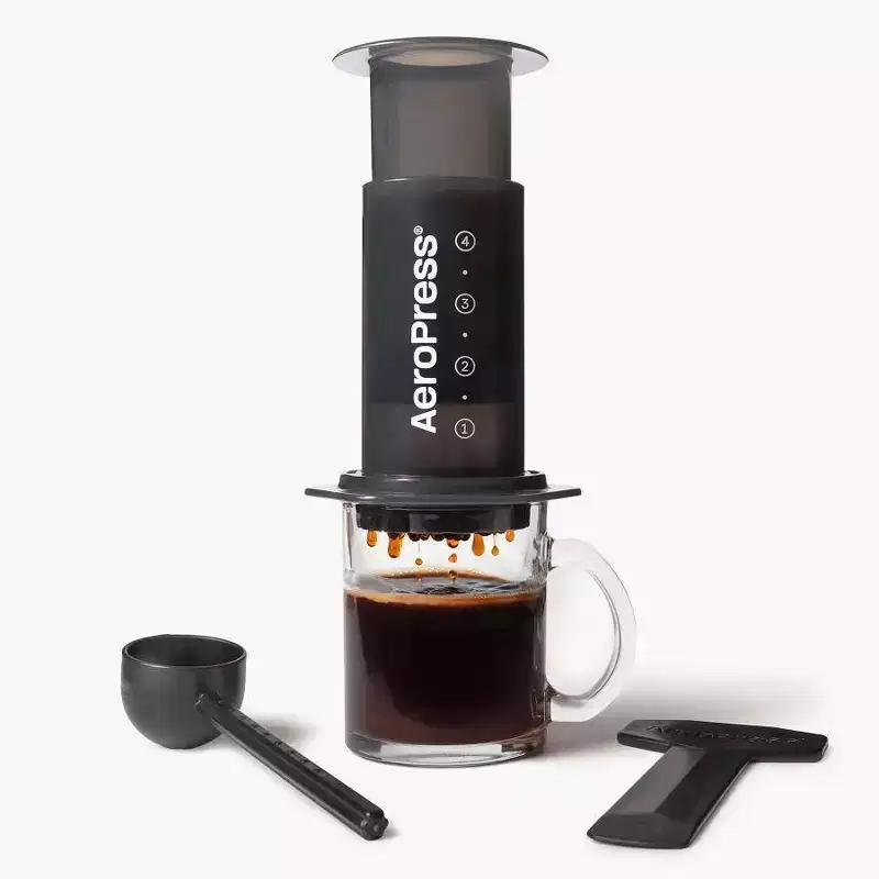 AeroPress Original Coffee Press: Manual Single Serve Coffee Maker, 8 oz Capacity, Includes Scoop #38; Paper Filters, Black