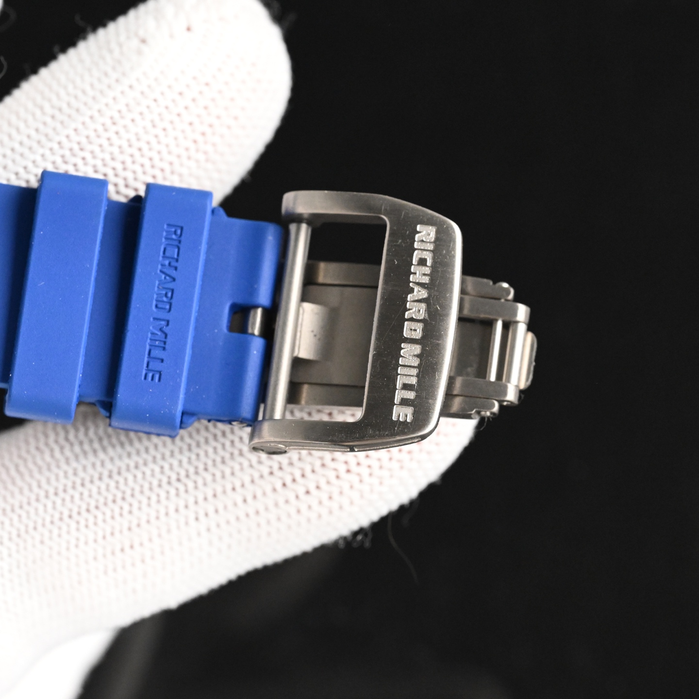 Richard Mille replica blue rubber strap and engraved folding clasp detail