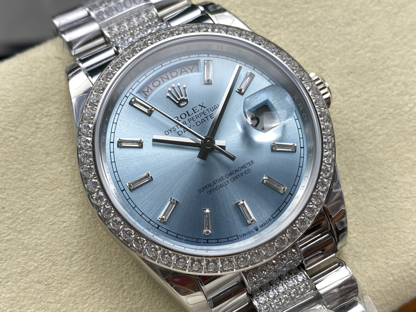 VSF Rolex Day-Date 40 replica with diamond-set bezel and ice blue dial, featuring the 3255 clone movement