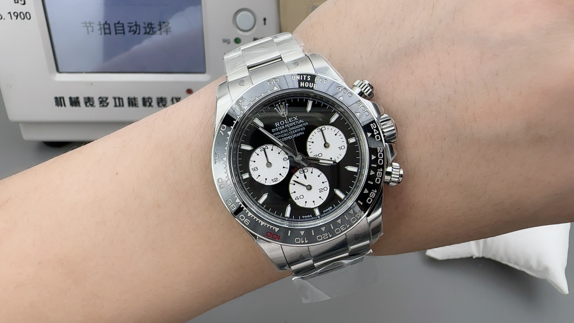 Clean Daytona Rolex replica watch on wrist