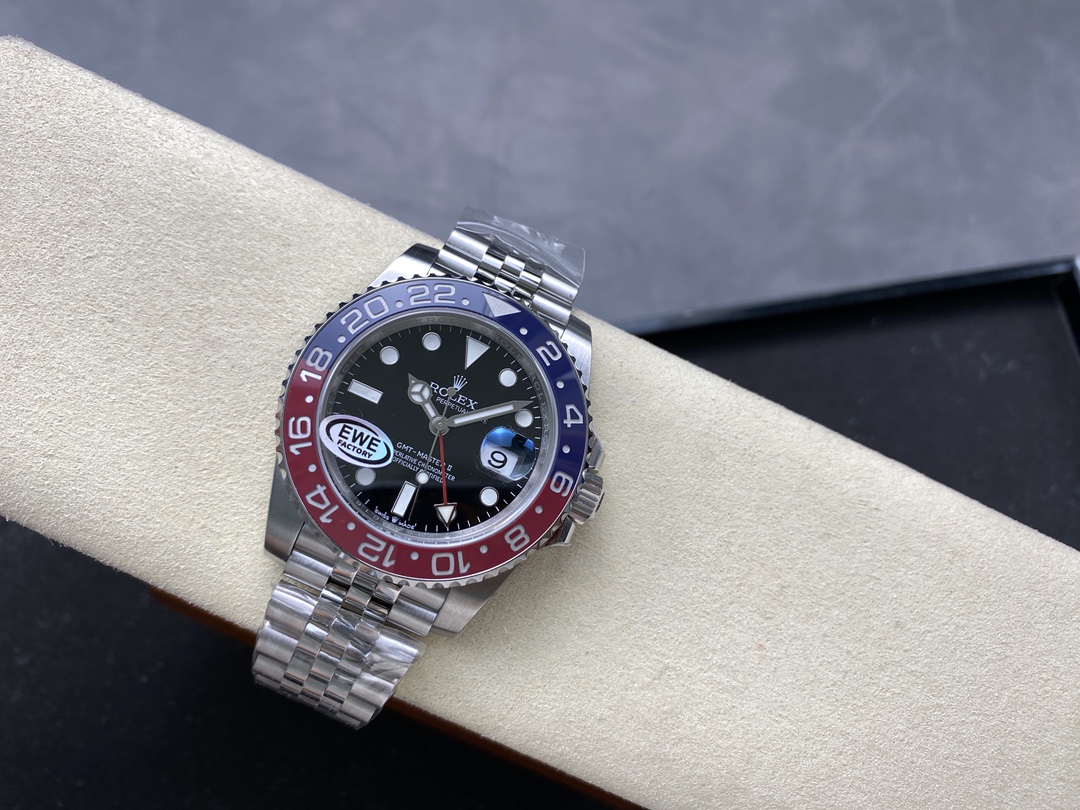 Rolex GMT-Master II Pepsi replica on beige watch cushion with Jubilee bracelet