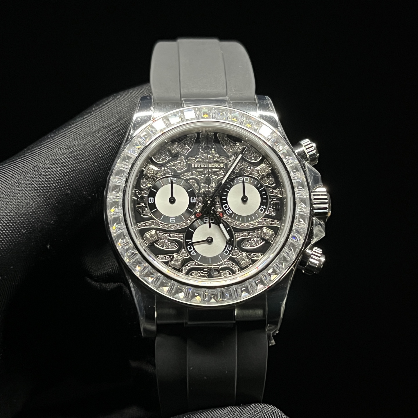 Front view of Rolex Daytona style replica watch with gem set bezel and skeleton dial