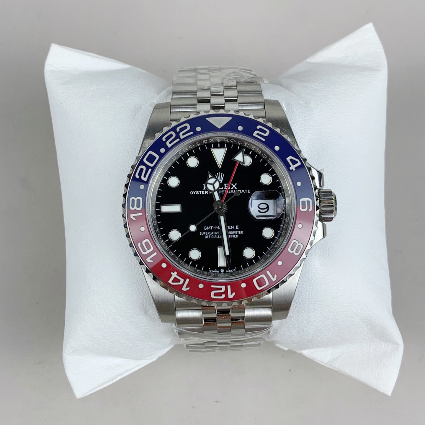 Fake Rolex GMT Master II Pepsi replica with Jubilee bracelet on display
