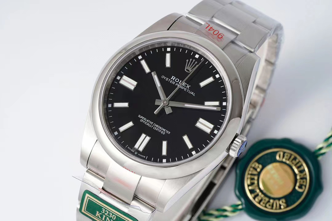 Replica Rolex Oyster Perpetual black dial with 3230 movement and green hang tag