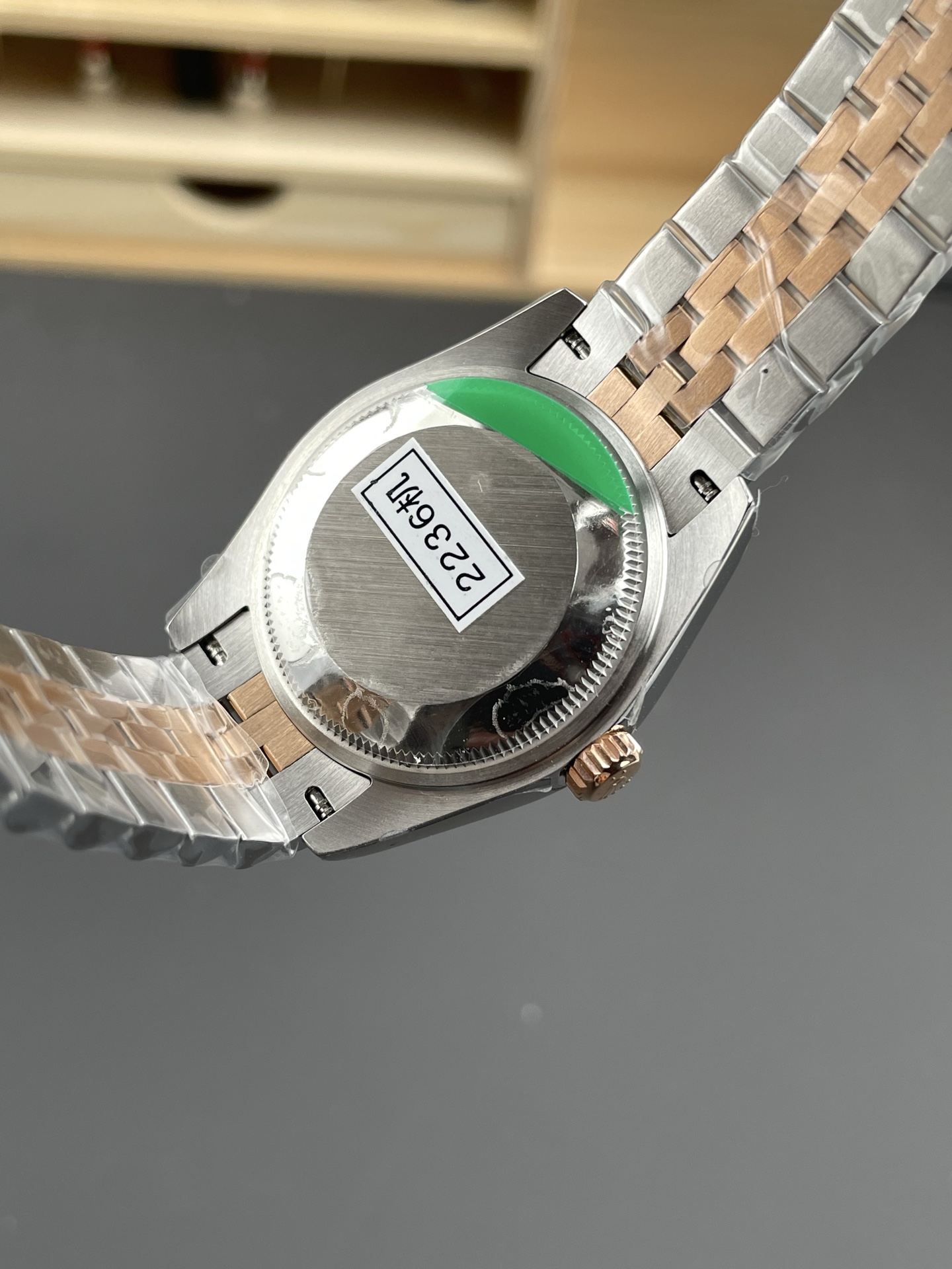 Caseback view of two tone Rolex Datejust replica watch with 2236 factory sticker and Jubilee bracelet