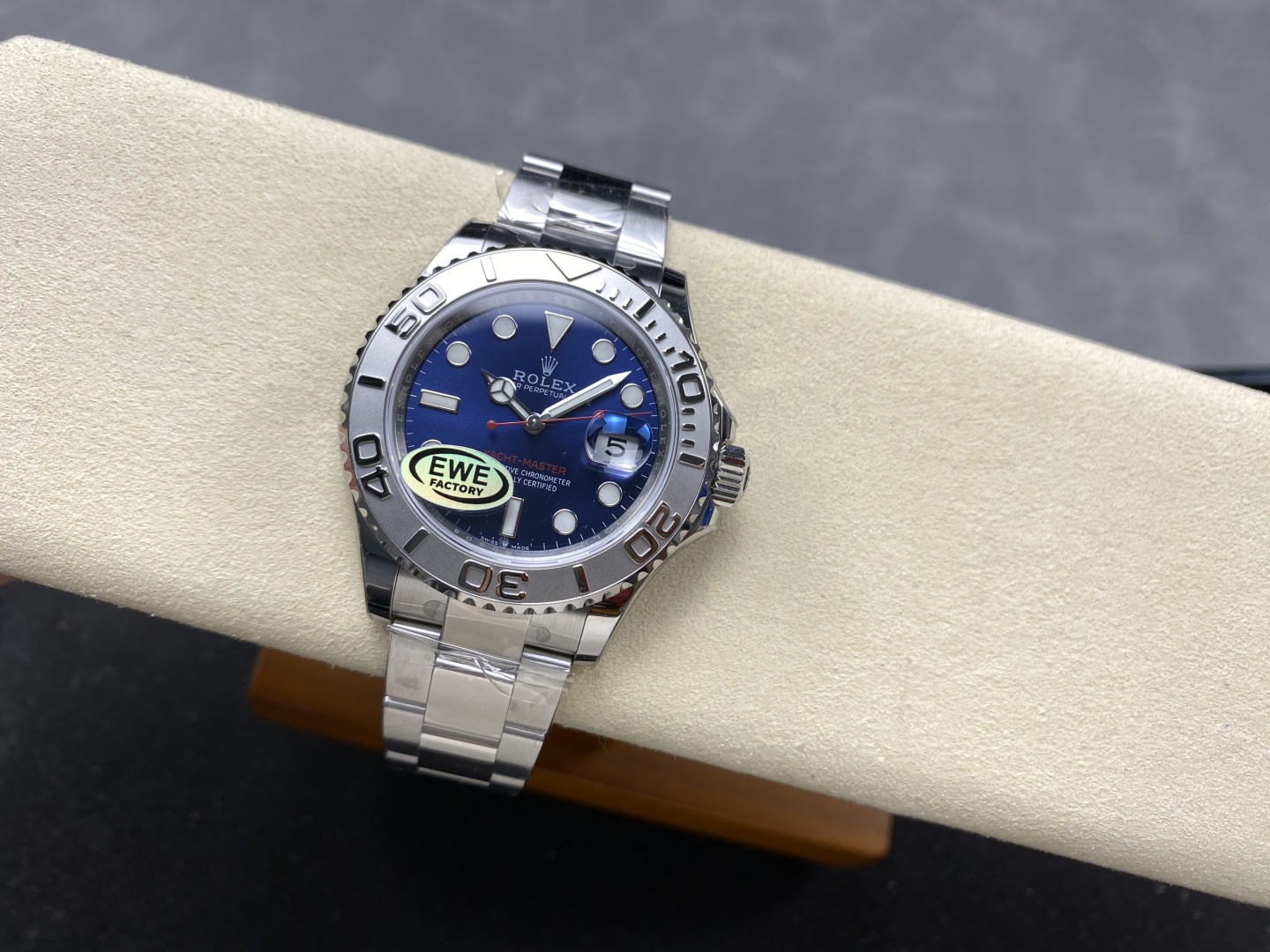 EWE Factory replica Rolex Yacht-Master with blue dial and factory sticker, representing a top-tier 3235 clone movement