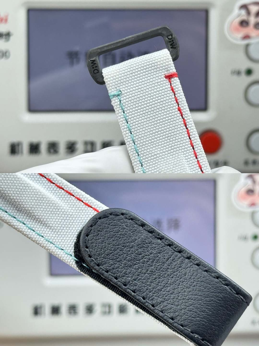 White nylon strap with black leather tip and DWC hardware on a replica watch