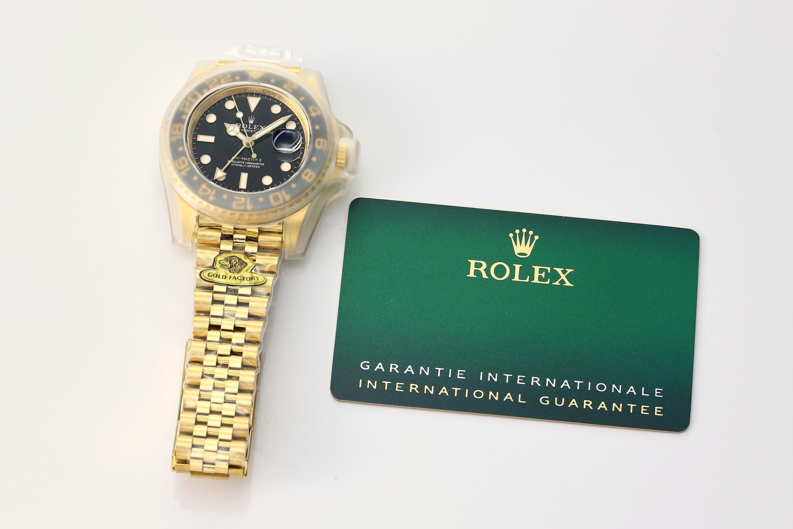Gouden Rolex GMT-Master II stijl horloge met internationale garantiekaart