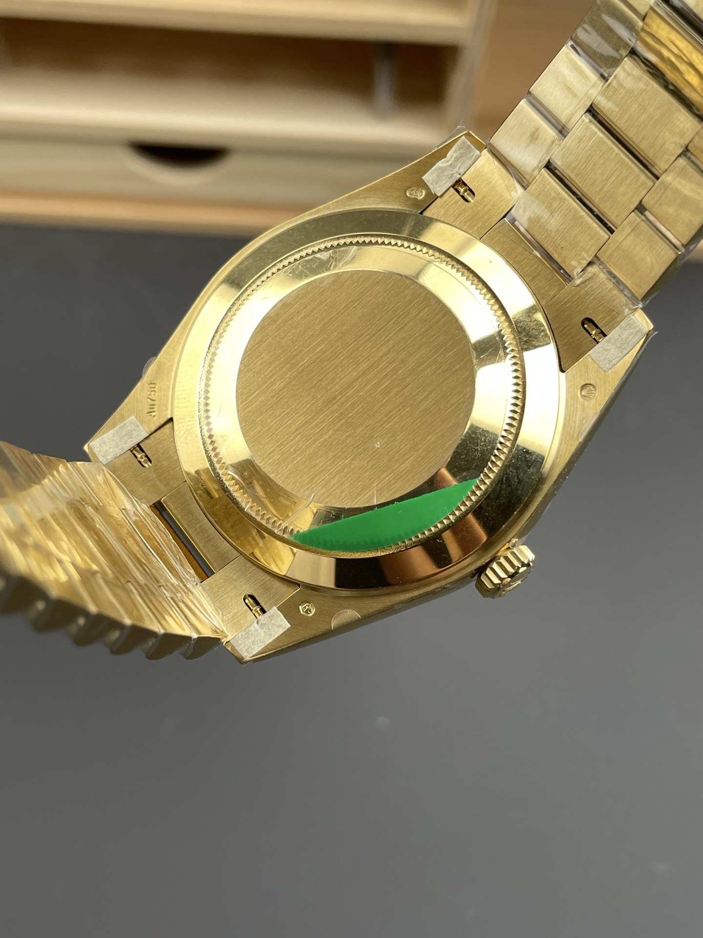 Gold Rolex Day-Date replica caseback and bracelet detail