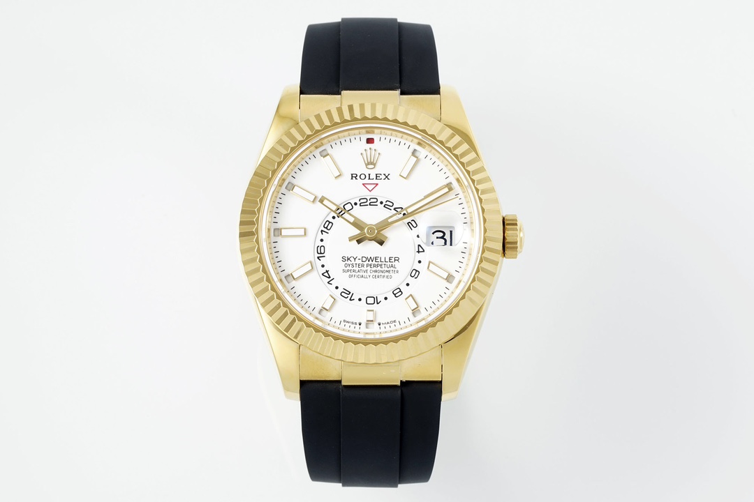 Top-down view of a gold Sky-Dweller 1:1 clone with a white dial and black rubber strap
